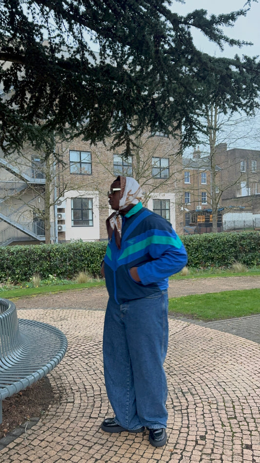 Vintage Reebok 90's Windbreaker with Classic Colour Block Design